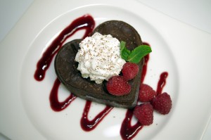 Heart-Shaped Chocolate Mousse Cake with Raspberry Drizzle