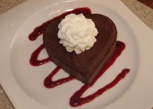 Chocolate Mousse Cake Garnished with Whipped Cream