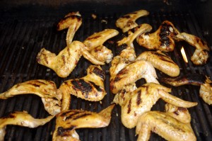 Chicken wings grilling on barbecue