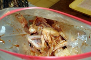 Chicken wings marinating in a sealable bag